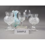 A pair of cut glass thistle lamps, six cut glass hocks and other glass