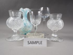 A pair of cut glass thistle lamps, six cut glass hocks and other glass