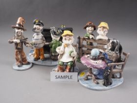 Seven Alan Young pottery figures and figure groups, including a witch, a man playing the piano,