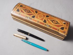 A Parker 61 turquoise and rolled gold fountain pen, a Mont Blanc No 22 fountain pen and a