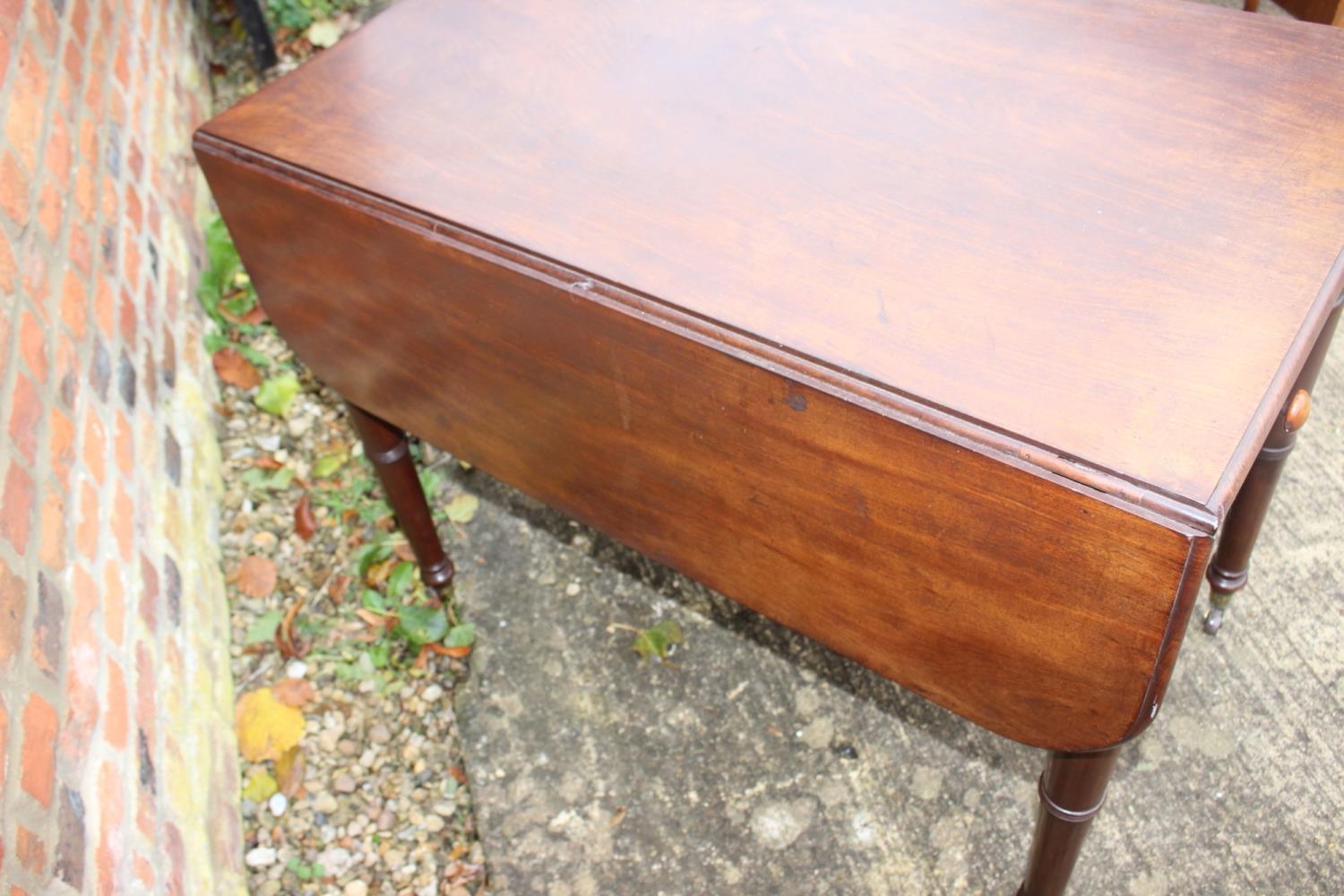 A 19th century mahogany Pembroke table, fitted one drawer, on turned supports, 35 1/2" wide x 21" - Image 3 of 3