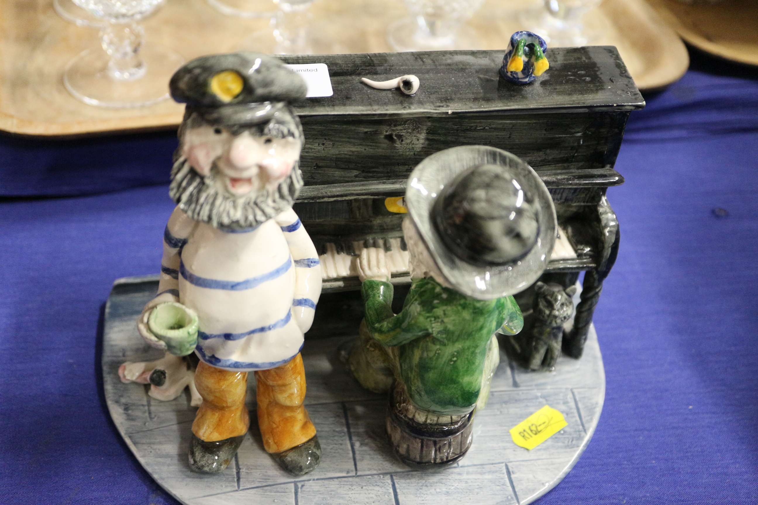 Seven Alan Young pottery figures and figure groups, including a witch, a man playing the piano, - Image 14 of 21