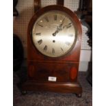 An Edwardian mahogany and line inlaid arch topped mantel clock with fusee movement, silvered dial
