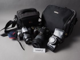 A Nikon D-80 digital camera, a Panasonic Lumix Model No DC-GX800 digital camera and three other