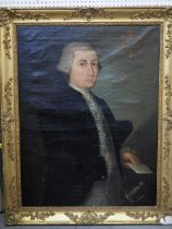 A mid 18th century French oil on canvas, portrait of a nobleman holding a letter with coat of arms