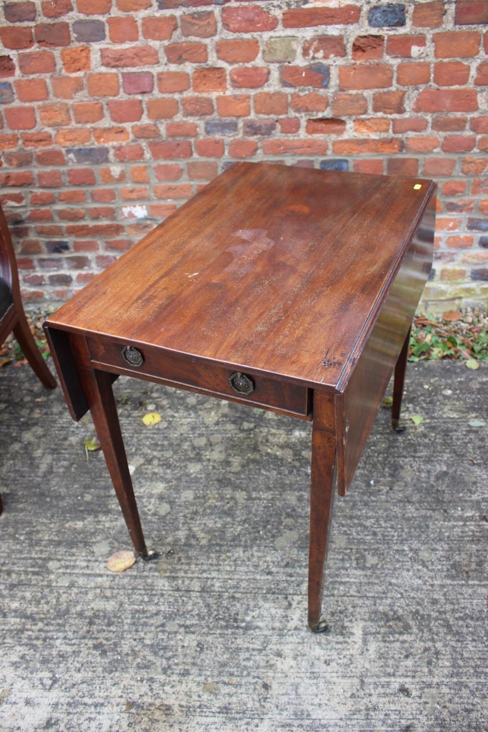 A 19th century mahogany Pembroke table, fitted one drawer, on square taper supports, 31" wide x