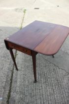 A 19th century mahogany Pembroke table, fitted one drawer, on square taper supports, 32" wide x