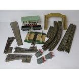 A quantity of Triang Solid 00HO gauge railway track together with sprung buffers,