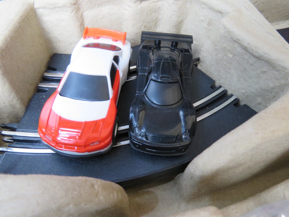 A Furious Challenger electric road racing set inc two cars, controllers and various track, - Image 2 of 4