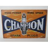 A contemporary metal garage Champion spark plug advertising sign 'More Power More Speed', 30 x 20cm.