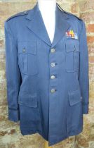 A US Air Force Enlisted dress tunic and trousers.