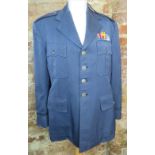 A US Air Force Enlisted dress tunic and trousers.