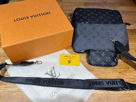 A brand new Louis Vuitton 'Trio' three-piece 'Messenger bag set in Monogram Eclipse canvas.
