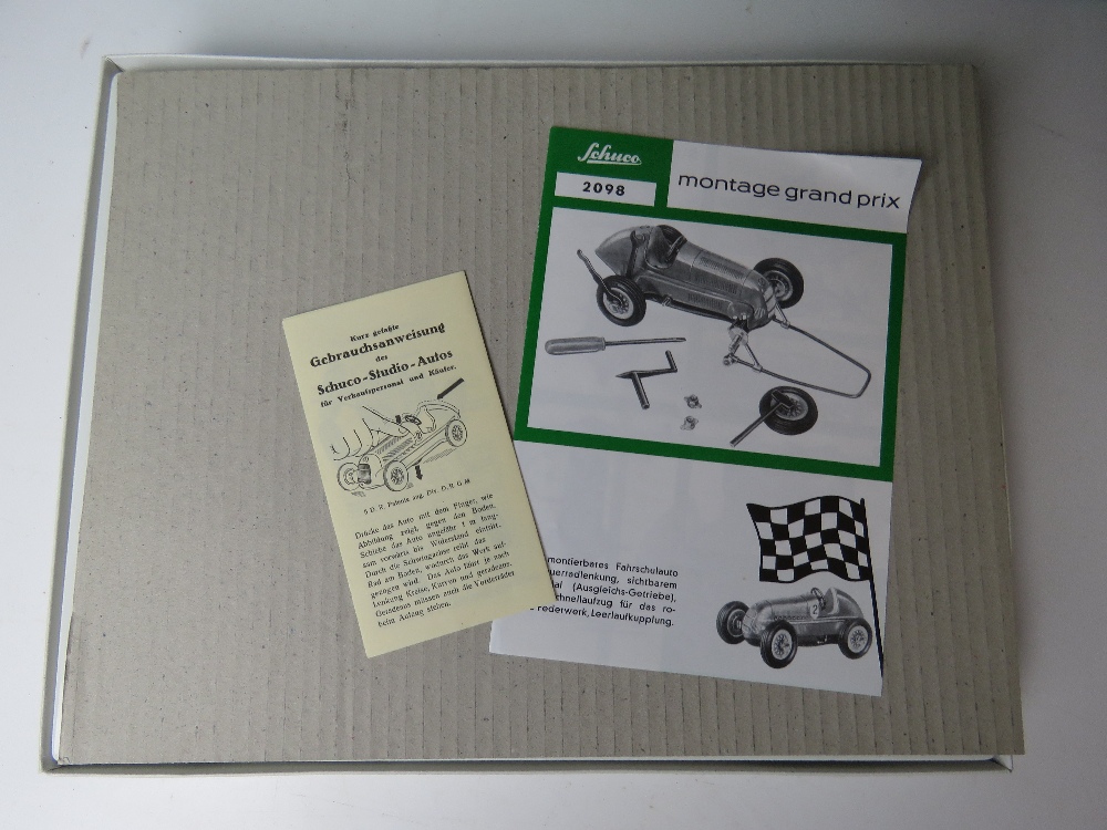 A Schuco Montage-Grand Prix Mercedes 1936 model car kit in original box with original sleeve. - Image 4 of 5