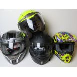 Four motorcycle helmets. For decorative use only, not tested for road use.