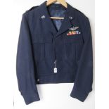 A US Airforce Officers short jacket with Major rank medal bars.