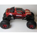A Pro Series '4 x 4 Offroad Rock Climber' RC vehicle, controller deficient, approx 70cm in length.