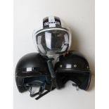 Three motorcycle helmets. For decorative purposes only, not tested for road use.