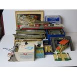 A quantity of Hornby, Meccano etc model railway etc including track, buildings and power unit etc.