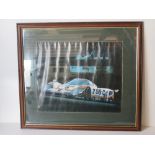 A large photographic print of a Silk Cut Castrol Jaguar XJR Race Car. Approx measuring 54 x 61cm.