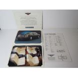A Bentley Continental R sales brochure and specifications card.