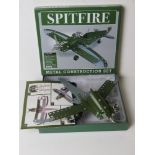 A part-built Meccano type metal construction set of a Spitfire, in unchecked condition.