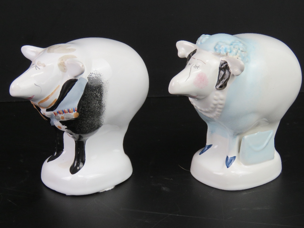 A pair of Royal themed Carlton Ware cartoon figurines designed by Malcolm Gooding 1984 being the