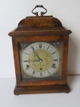 An Elliott of London George III design walnut and mahogany table clock having silvered style