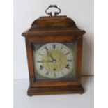 An Elliott of London George III design walnut and mahogany table clock having silvered style