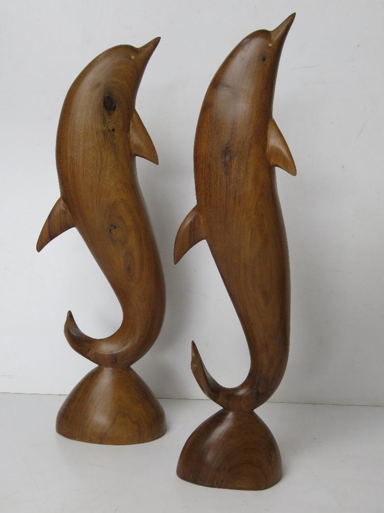 A pair of carved wooden dolphin figurines, one having repair to dorsal fin, each standing 37cm high. - Image 4 of 5