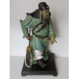 A Christopher W Limited Edition figurine of a Japanese warrior, stood on hardwood base, a/f.