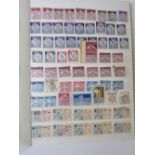 A collection of 20th century World Stamps in seven albums includes Ceylon and Rhodesia.