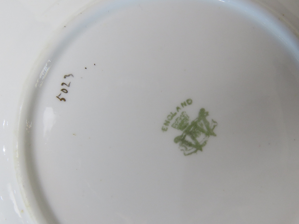 A cake plate with eight matching side plates marked England to base in cream and green floral - Image 3 of 4