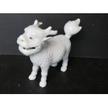 A late 19th / early 20thC Japanese Hirado porcelain figure of a Kirin - mythical creature having