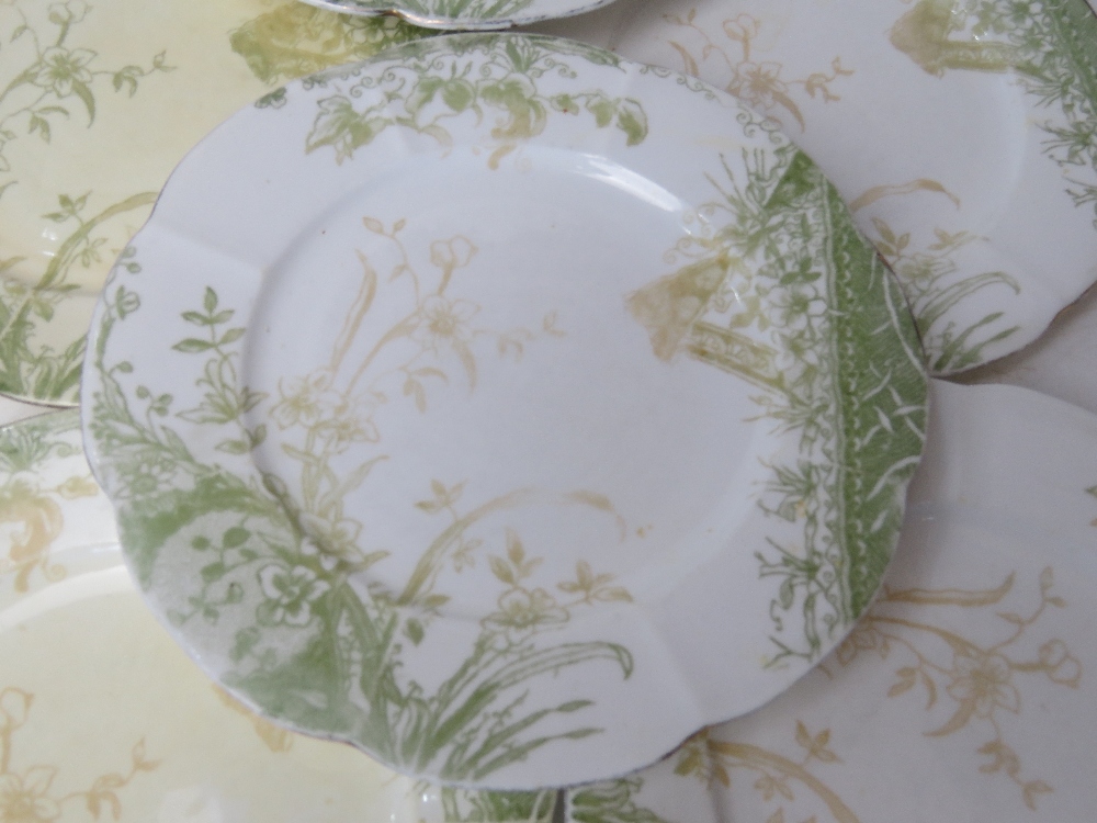 A cake plate with eight matching side plates marked England to base in cream and green floral - Image 2 of 4