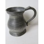 A pewter tankard marked for Yates & Birch standing approx 12cm high.