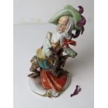 A Capo di Monte musketeer, a/f, standing approx 30cm high.