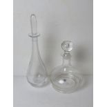 A Dartington crystal decanter bearing label upon, together with another similar.