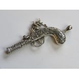 A HM Sterling silver whistle pendant in the form of an 18th century flintlock pistol,