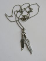 A Native American style two feather pendant in 925 silver on a 925 silver chain.