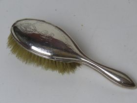 A HM silver hair brush, bristles a/f.