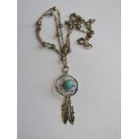 A Native American style dreamcatcher pendant on chain,
