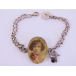 A HM silver double chain link bracelet having vintage style portrait to centre,