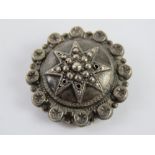 A white metal mourning brooch having glazed panel verso, a/f.