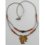 A Native American Navajo style silver beaded and Tigers eye necklace.