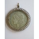 An 1896 United States of America one dollar coin, loose mounted in pendant.