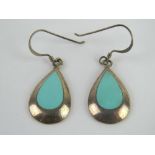 A pair of silver and turquoise earrings, stamped 925. In presentation box.