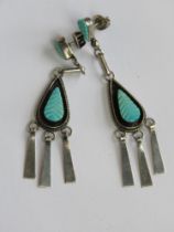 A pair of Native American style earrings in white metal and turquoise with 925 silver butterfly