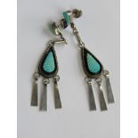 A pair of Native American style earrings in white metal and turquoise with 925 silver butterfly