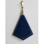 A large Lapis Lazuli pendant with white metal bale measuring 6cm inc bale.